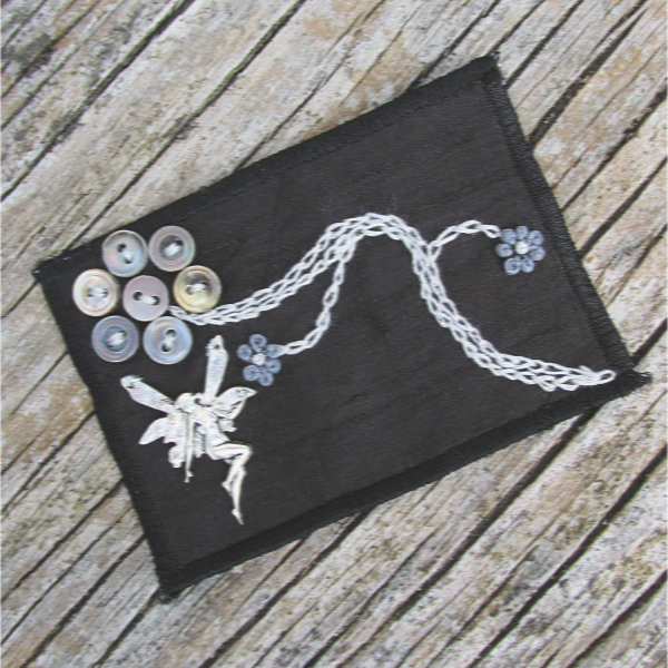black silk ACEO with gray button flowers and a silver fairy