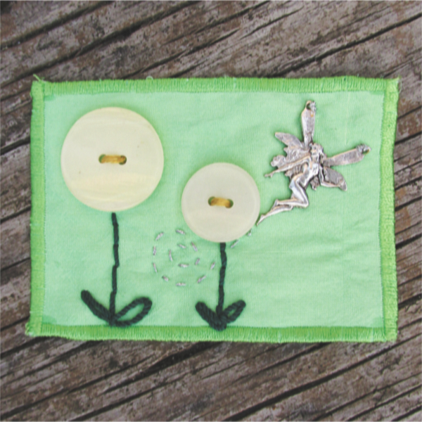green silk ACEO with white button flowers and a silver fairy