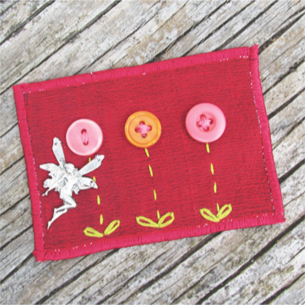 red silk ACEO with pink and orange button flowers and a silver fairy