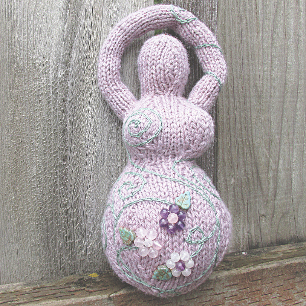 lavender knitted goddess with beaded flowers
