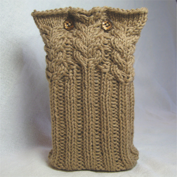 wheat colored cable knit pouch with button closure