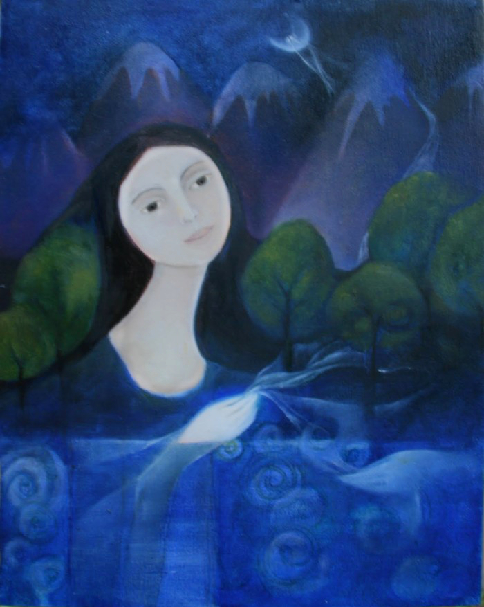 a woman in front of mountains and trees